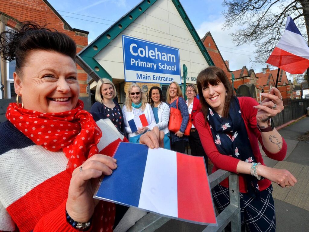 Teachers with French flags